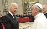 Pope Francis greets then-US vice president, Joe Biden, in St. Peter’s Basilica at the Vatican on 19 March 2013, following his inaugural Mass. Photo: CNS /Vatican Media
