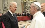 Pope Francis greets then US vice president, Joe Biden, in St. Peter’s Basilica at the Vatican on 19 March 2013, following his inaugural Mass. Photo: CNS /Vatican Media