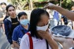 People wearing facemasks receiving ashes during the Ash Wednesday Mass at the National Shrine of Our Mother of Perpetual Help in Manila, the Philippines, on 26 February 2020. Photo: CNS/Reuters
