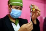 A nurse with the Oxford-AstraZeneca vaccine at the Dhaka Medical College vaccination centre in Dhaka, Bangladesh. Photo: CNS/Reuters
