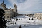 People walk outside the Almudena Cathedral in Madrid on January 10, following snowfall. Photo: CNS/Reuters