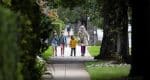 Wearing protective facemasks, a family goes for a walk in Pasadena, California, in April 20209. Photo: CNS photo/Reuters