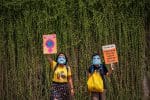 Young people carrying placards and wearing masks take part in a protest on Earth Day in Jakarta, Indonesia, on April 22. Photo: CNS/Reuters