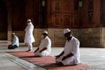 Muslim men wearing masks offer prayers at a mosque on the first Friday of Ramadan, on May 1. Photo: CNS/ Reuters