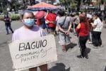 People queue to look for food at a community pantry in Baguio City in the Philippines. Photo: UCAN/supplied