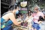 People look to see what’s on offer at a community pantry in Quezon City in Manila. Photo: UCAN/supplied