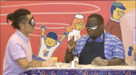 Father Dominique Mukonda participates in a food guessing game during the online show.