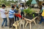 Seminarians from Saint John Mary Vianney Seminary distribute saplings at their ‘pan-tree’ in Tagaytay, Cavite province, the Philippines. Photo: UCAN/Father Reynaldo Caluto