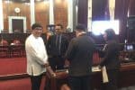 Father Aquino, left, inside the session hall of the Supreme Court of the Philippines. Photo: UCAN/supplied