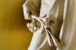 Lilies in the hand of a statue of St. Joseph in St. John’s Seminary, Boston, the United States. Photo: sjsboston/Unsplash