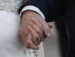 A newly married couple hold rosaries in their hands as they leave Pope Francis' general audience in St. Peter's Square at the Vatican in 2016. File photo: CNS/Paul Haring