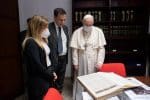 Pope Francis with Andrea Monda, left, director of L’Osservatore Romano, as he visits the staff of Vatican communications outlets at Palazzo Pio at the Vatican May 24. Photo: CNS/Vatican Media