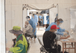 Homeless people consult with volunteer doctors. Photo: Committee for Communications, Archdiocese of Seoul