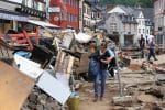 People walk through a flood-devastated area in Bad Münstereifel, Germany, on July 19. Photo: CNS/Wolfgang Rattay, Reuters