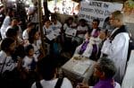 Father Villanueva celebrating the funeral Mass of Myca Ulpina, who was only three-years-old when she was killed in 2019. Police claimed she was used as a human shield. The girl's mother has rejected that version of events. File photo: CNS/Eloisa Lopez, Reuters