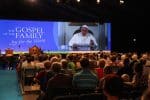 Attendees watch Pope Francis on a screen during the opening ceremony of the World Meeting of Families in Dublin in August 2018. Photo: CNS/John McElroy, courtesy World Meeting of Families