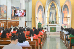 Bishop Joseph Ha Chi-shing encourages migrant workers to carry out their mission during a Mass at St. Joseph’s parish, Garden Road, on July 1.