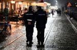 Police officers patrol a street in Milan in 2020. Photo: CNS/Flavio Lo Scalzo, Reuters