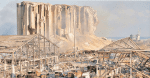 Smouldering debris following two massive explosions that tore through the port of Beirut on 4 August 2020. Shock waves from the explosion flattened nearby structures, shattered glass and shook buildings throughout the city Photo: CNS/Reuters