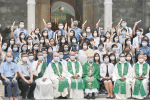 Graduates showing their certificates with joy after the graduation ceremony.