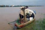 Climate change and dams have resulted in unpredictable wet and dry seasons and upset fish spawning patterns on the Mekong River. Photo: UCAN/Ah Ny