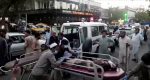 A screen grab showing people bring an injured person to a hospital in Kabul, Afghanistan, after two suicide bombers and gunmen attacked an entrance to the Kabul’s Hamid Karzi airport on August 26—the attack was claimed by ISIS-Afganistan. Photo: CNS/TV/1TV/Handout via Reuters