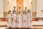 Front row from left to right: Sister Louise Lam, vice provincial; Sister Rita Chung, provincial councillor, Sister Virginia Wong, provincial superior; Sister Wong and Sister Cheung. Back row from left to right: Father Yim, Father Lam and Father Tong Photo: Canossian Missions