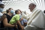 Pope Francis blesses a child during an audience with the faithful from the Diocese of Rome at the Vatican September 18. Photo: CNS/Vatican Media