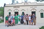 Cardinal Tong and Father Choy and Father Duggimpudi with parishioners from the Sacred Heart Church, Sai Kung, outside the restored Star of the Sea Mass Centre.