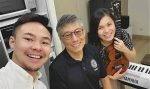 Father Chow with the AMDG music band. Photo: Facebook page of AMDG