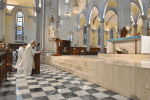 Cardinal Tong leads the Eucharistic Adoration.