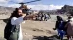 Rescuers carry injured people to a helicopter following an earthquake in a mountainous, remote region of Afghanistan, June 22, 2022, in this screen grab taken from a video. (CNS photo/BAKHTAR NEWS AGENCY, handout via Reuters) NO ARCHIVES. MUST DISCARD 30 DAYS AFTER DOWNLOAD.
