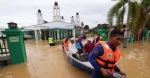 Floods in Malaysia result in four dead and over 80,000 displaced 