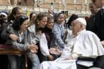 Carry the cross with compassion recovering pope says on Palm Sunday