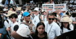 Filipinos protest corruption by wearing white for Mass 